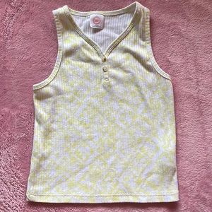 This is a yellow and white Wonder Nation tank top.